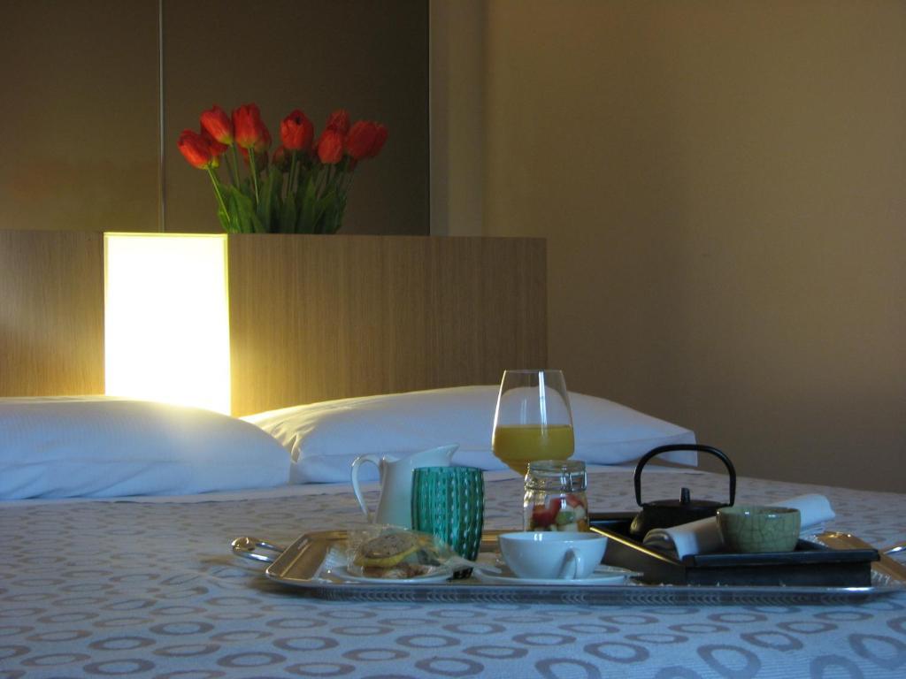 Parizzi Suites & Restaurant Parma Ruang foto