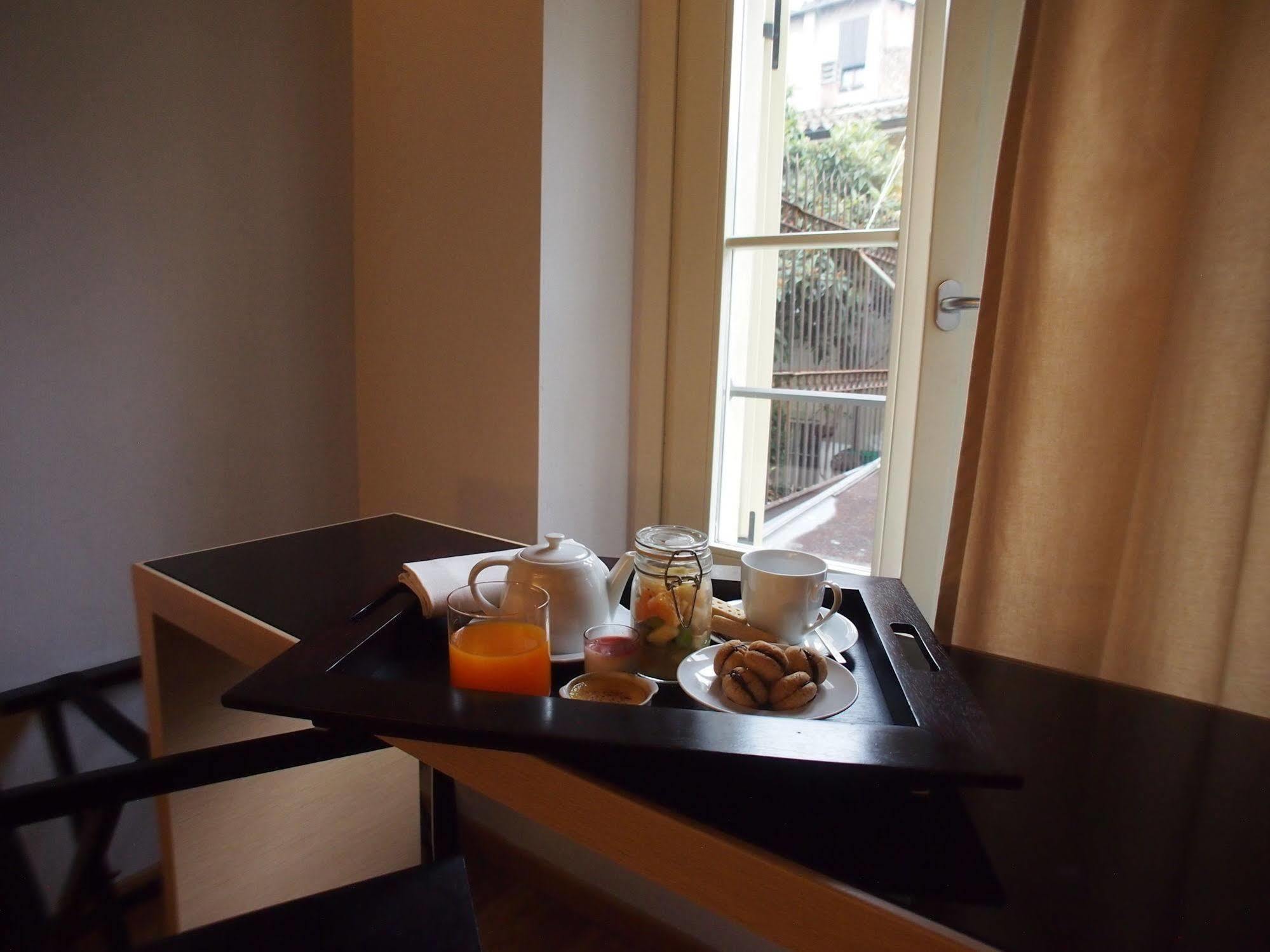 Parizzi Suites & Restaurant Parma Bagian luar foto